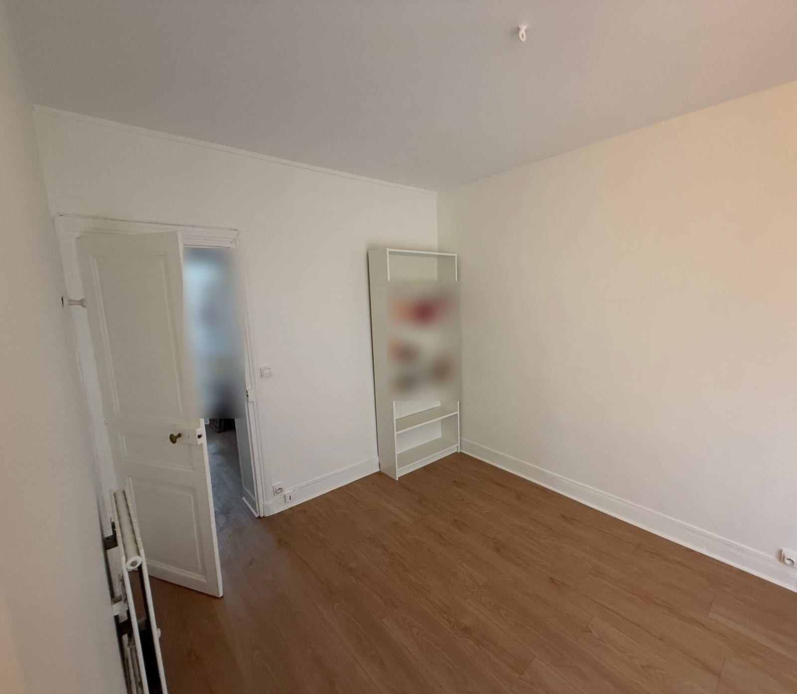 Deux chambres et un couloir repeints en blanc à Paris 17e, photo 1